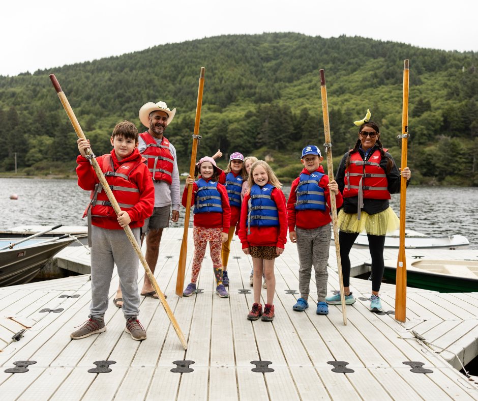 Bobo & Banana with campers boating 